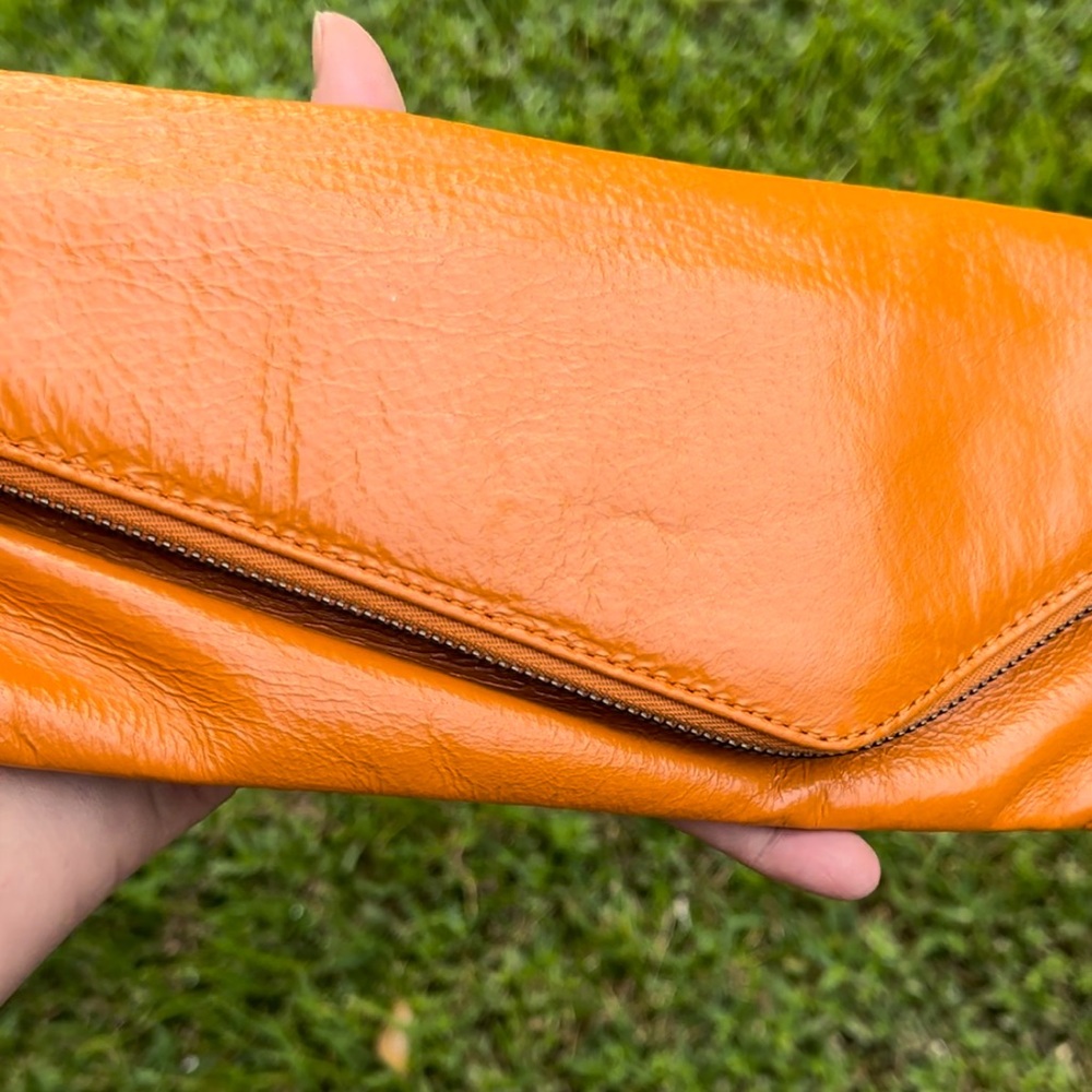 GUC Hobo International Deep Assymetrical Clutch Orange Pumpkin